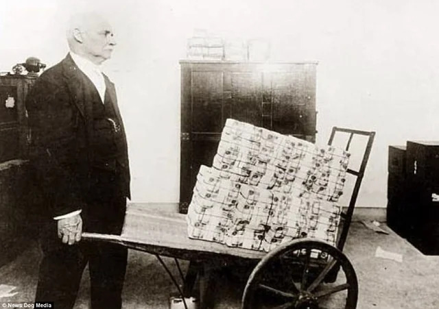 1051824001_wheelbarrowofmoney.jpg