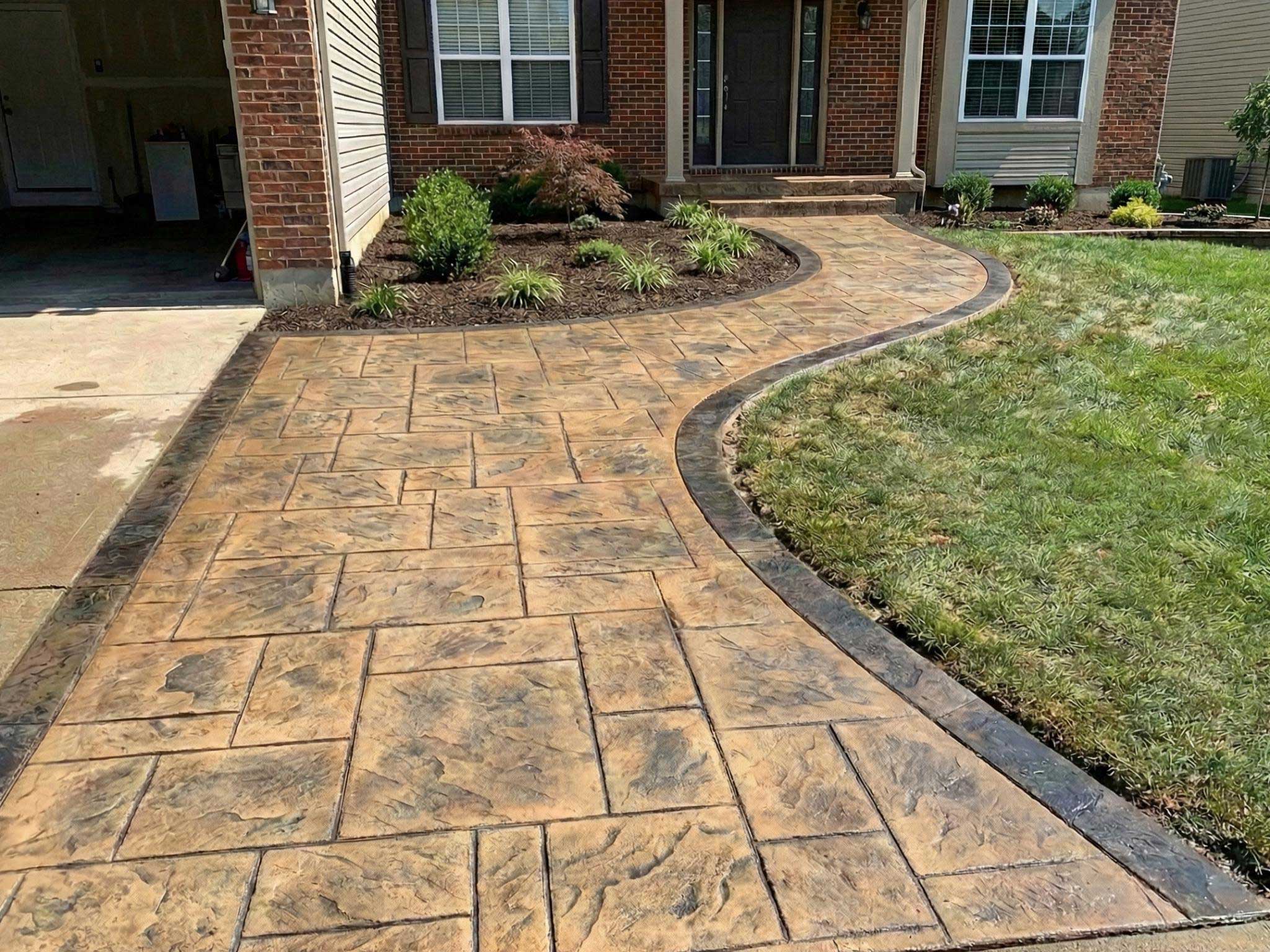 A newly completed sidewalk that is stamped.