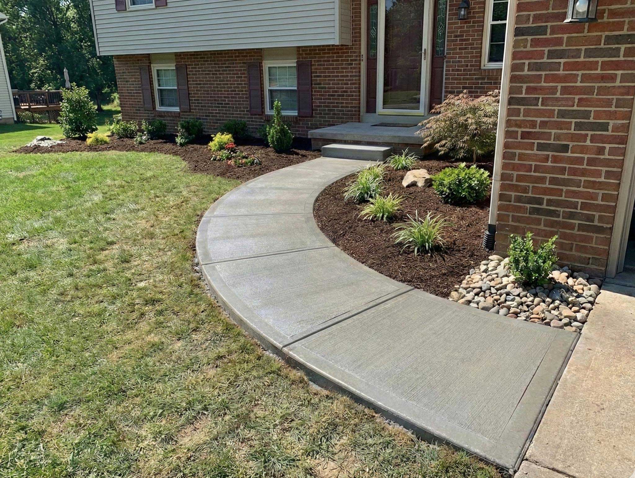A new sidewalk leading to front of house.