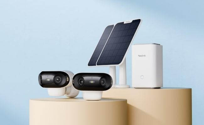 Picture of 2 cameras, solar panel and wifi box.